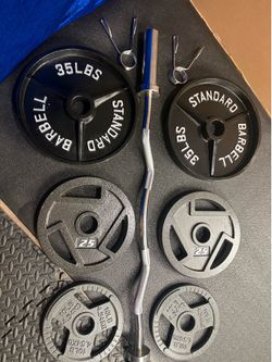 NEW Olympic Equipment Curl Bar of 20# with Cooper Bearings and Plates 2X35s, 2X25s, 2X10s and 2X5s pounds. Brute 170#
