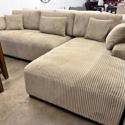 Beige corduroy sectional sofa Left hand facing chaise
