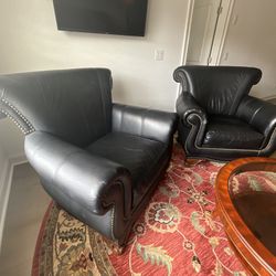 Pair Of Thomasville Plush Leather Chairs And Ottoman