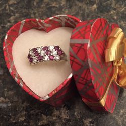 Sterling silver red and white crystal ring. Size 6 1/2. Makes the perfect gift. Will be sold in a gift box you don't even have to wrap it. Please also