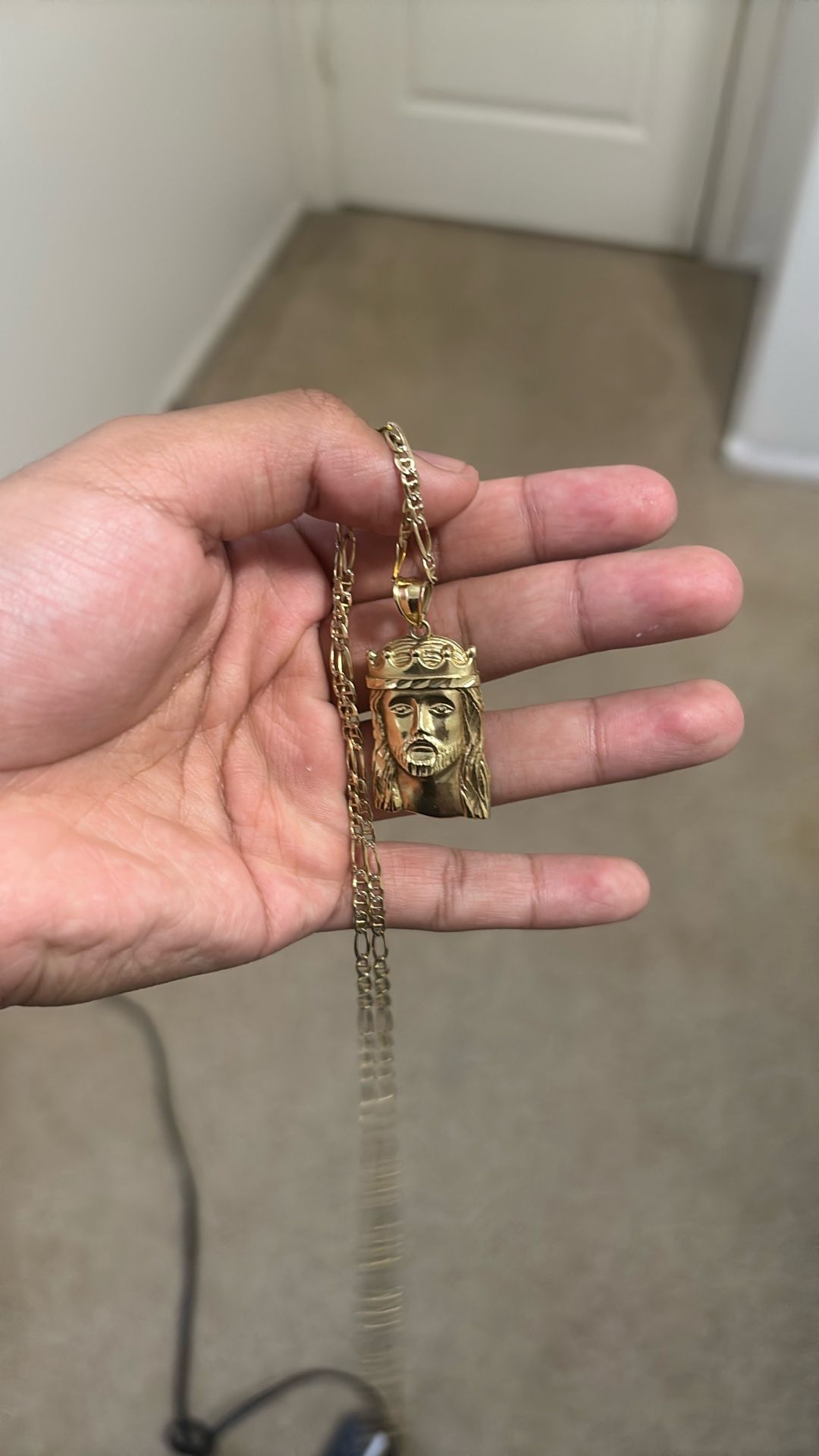 14kt chain with 10k jesus pendant