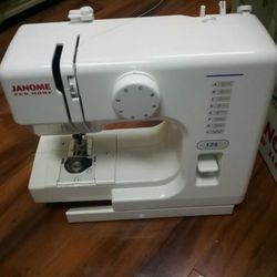 Janome New Home 124 electric sewing machine, white, small, 5 lbs, ages 8+