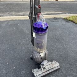 2 Dyson Vacuums