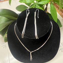 A Set Of Necklace And Earrings 