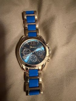 Geneva blue and gold watch