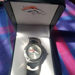Mens  watch, by gametime,I ASK  $40.00 it's a  brand new