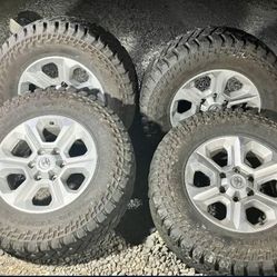 LT265/70R17 MT-3 • DeanTires • Backcountry Studded Mud Terain Tires with Rims