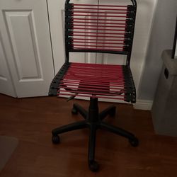 pink/ black bungee container store desk chair