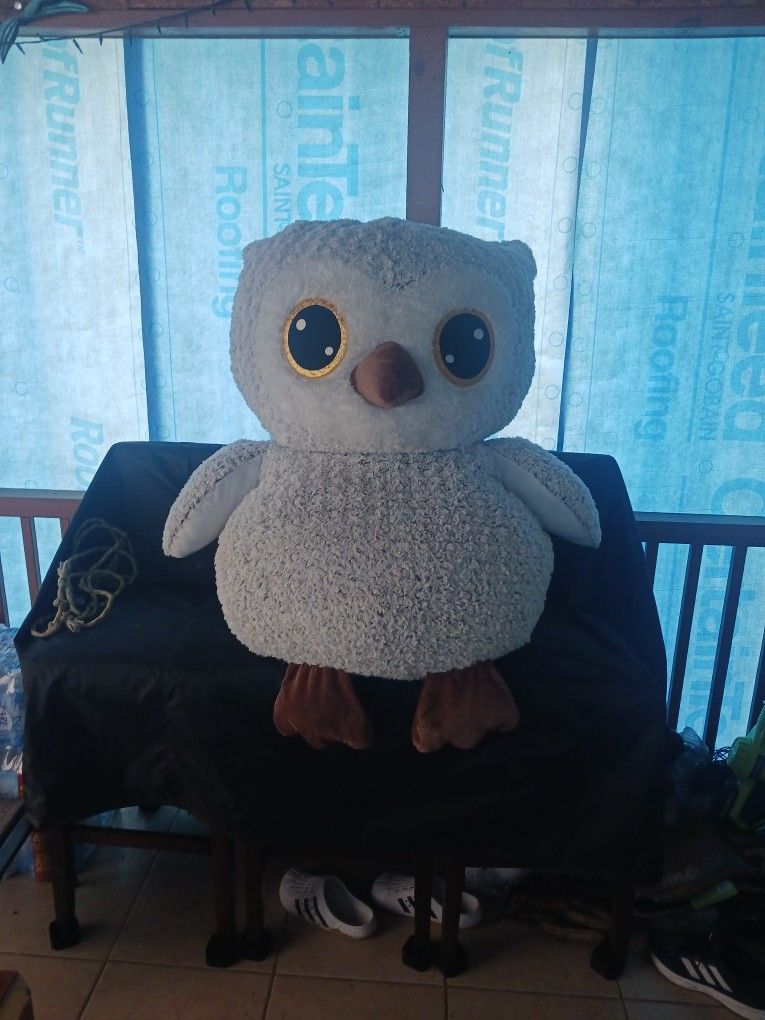 A Stuffed Anmial Owl In Perfect Conditions