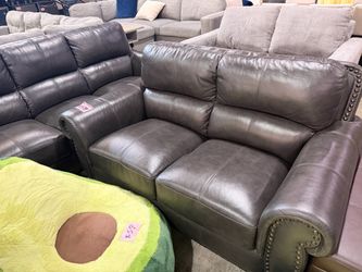 Black leather set couch + loveseat from Costco