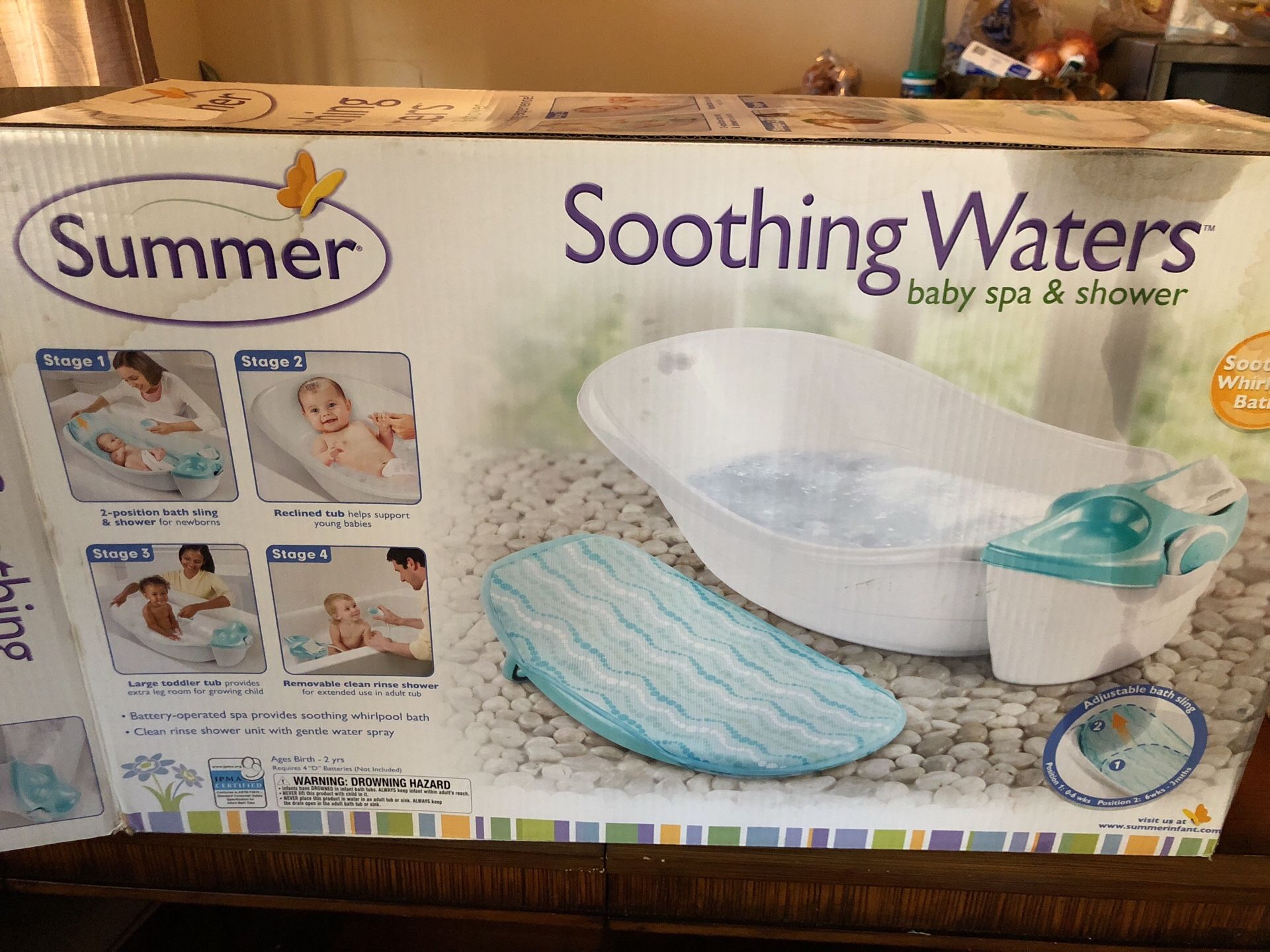 Soothing waters baby spa and shower