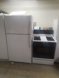 White refrigerator stove and fridge