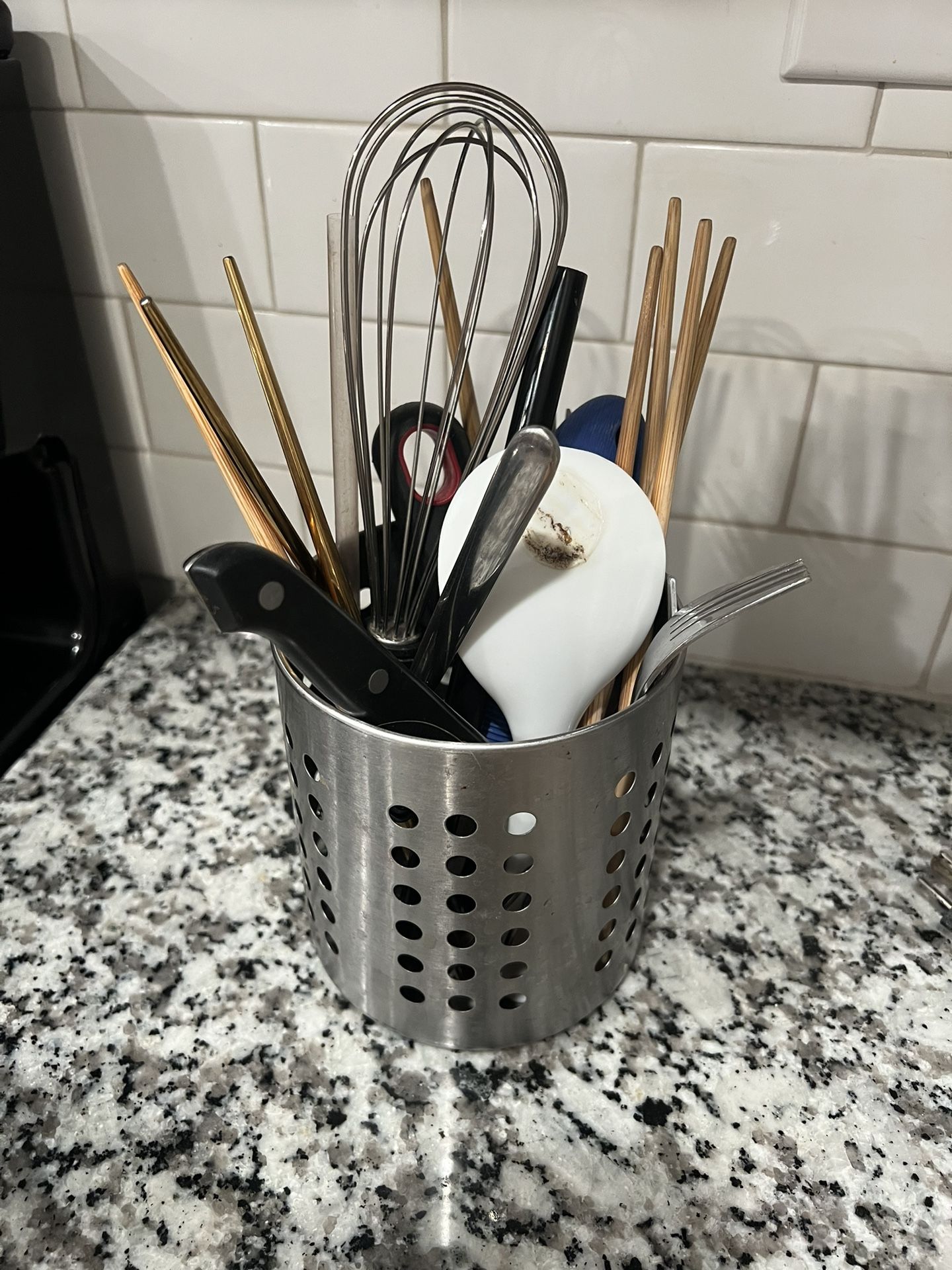knifes spoons chopsticks and container