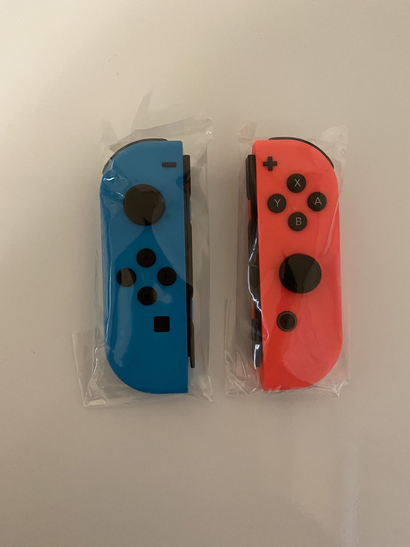 Brand new Nintendo switch joycon never used! Neon blue and neon red