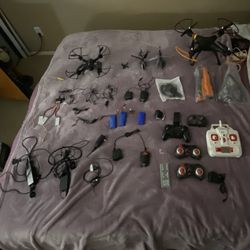 3 Drones And 2 Helicopters And Chargers And Extra Batteries