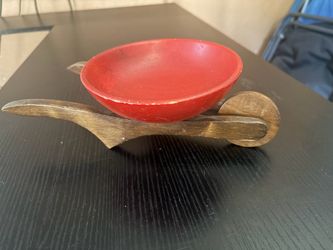 Decorative Red Bowl on Wooden Stand