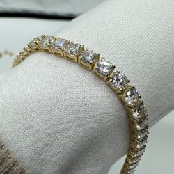 10KT Gold 4MM Tennis Braclet in 925 Silver with a CTW of 15.00