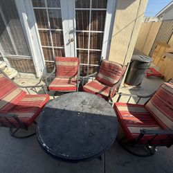 Great quality comfortable 4 rocking and spinning chairs with table  