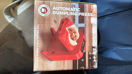 Automatic dumpling press