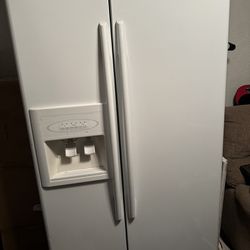 Refrigerator god condition. 35W x 69 L 