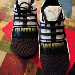 Brand Nrw Pumas Size 8. White Gold/black