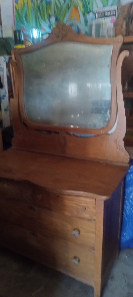 Antique Serpantine Dresser With Mirror