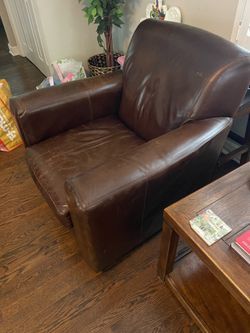 Brown leather lounge chair