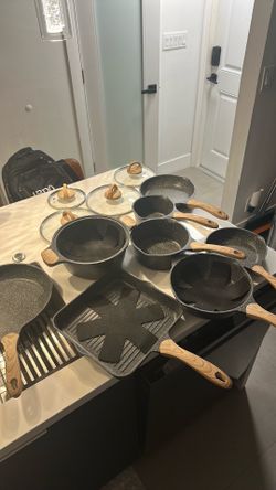 Full set of pots and pans with lids