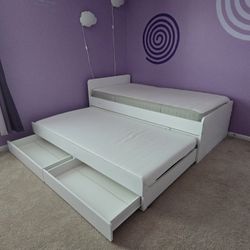 Twin bed with trundle and drawers