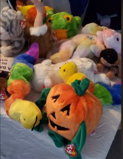 Brand new lots and lots of beanie babies with tags. ( never used ) .