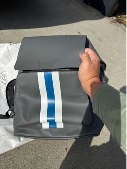 Brand new with tag Calvin Klein gray man made durable faux leather classic backpack  Size 11x7x18 inches