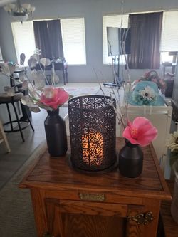 Candle and flower vase