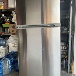 refrigerator, top and bottom. In good condition and clean,