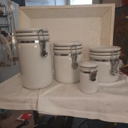 SET OF 4 WHITE CERAMIC CANISTERS 