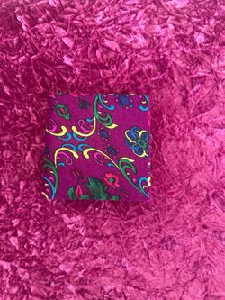 Artisan Fabric , Covered Journal with a Fuchsia Base and Colorful Floral Patterns