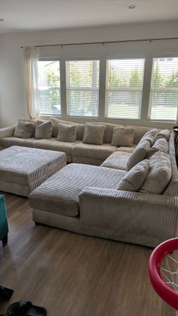 Ashley furniture - Lindyn Beige corduroy 7 piece modular sectional with chase and ottoman