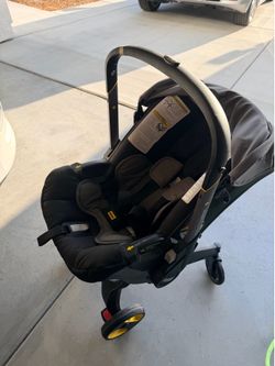 Doona Car Seat and Stroller- light grey
