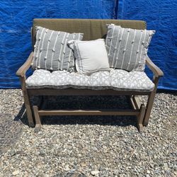 Teak rocking bench with cushions. Paid 500 for it 