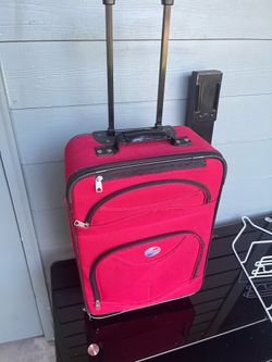 Great deal great condition Red tag 20” length suitcase luggage on wheels 🛞