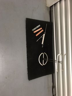 Paper towel holder & knife sharpener