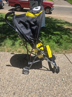 Cosco kids stroller, with shade cover.