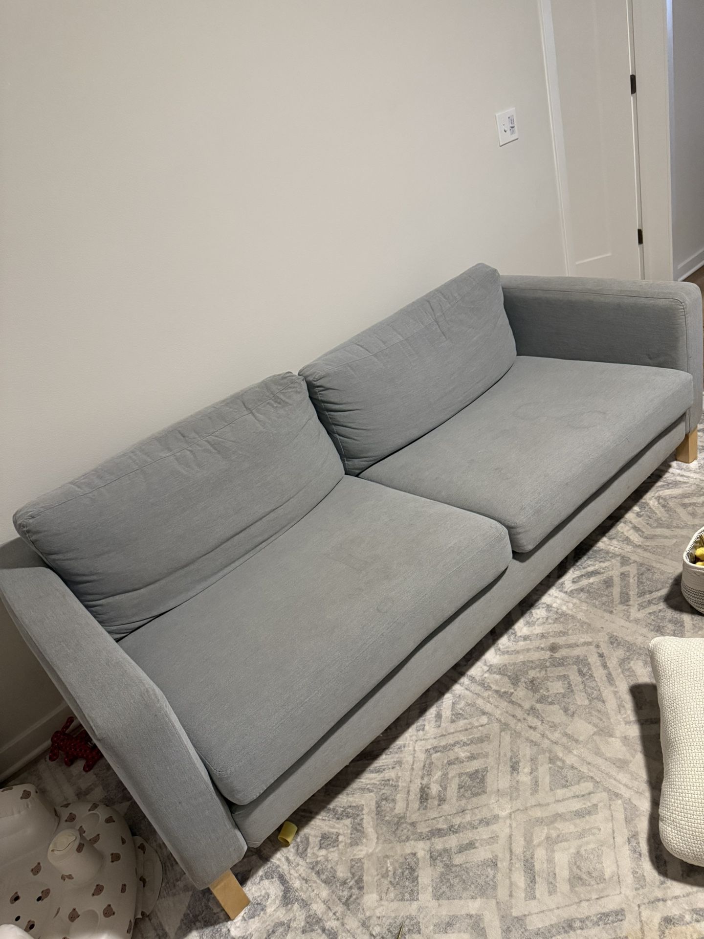 Ikea Couch + Set of 2 throw pillows.