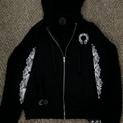 Black and white cross full zip up jackets.