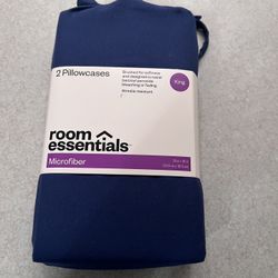 set of two Room Essentials Microfiber King Pillowcases in a navy blue color