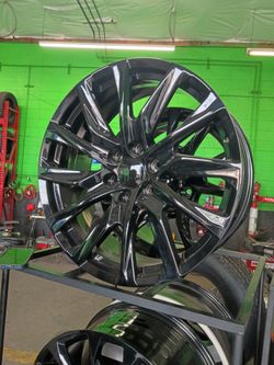 22x9 6x139 black rims on new tires 305 40 22