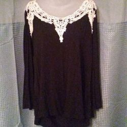 Womans Sexy Brand SLINKY top. Black/ ivory white crochet neckline
