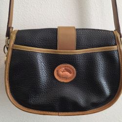 Vintage Dooney & Bourke All Weather Leather (AWL) Crossbody / Saddle Bag in black pebbled leather with tan trim
