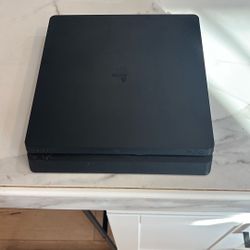 Ps4 slim with blue controller and games 
