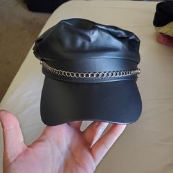 Black faux leather newsboy style hat w/ chain detail
