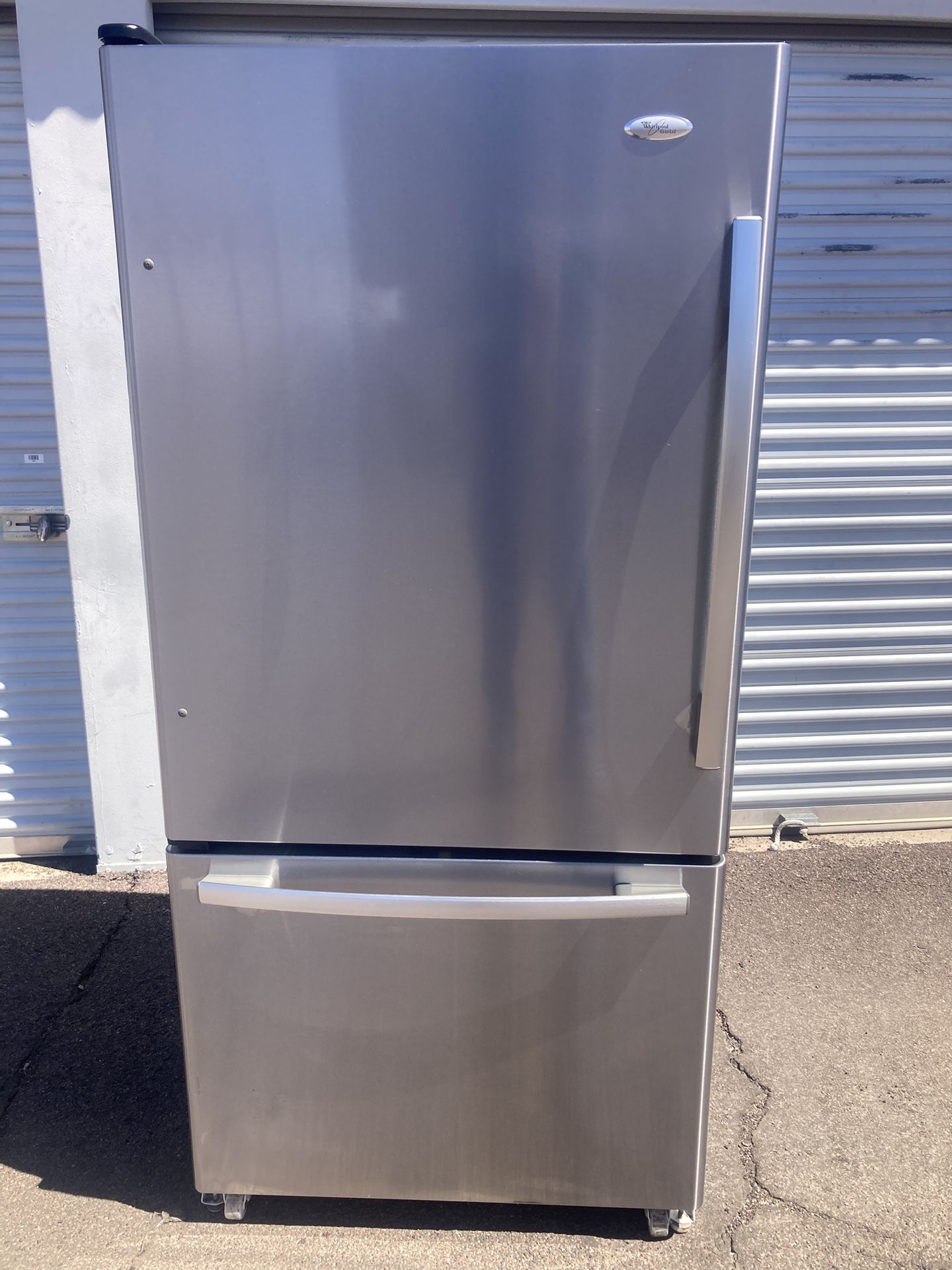 Whirlpool bottom freezer stainless steel refrigerator in good condition, clean and nice, one month warranty, delivery available W33-D31-H69